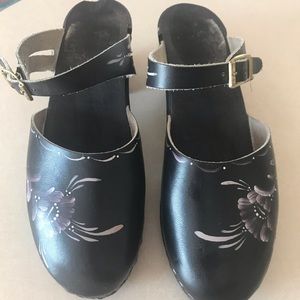Black vintage painted clogs